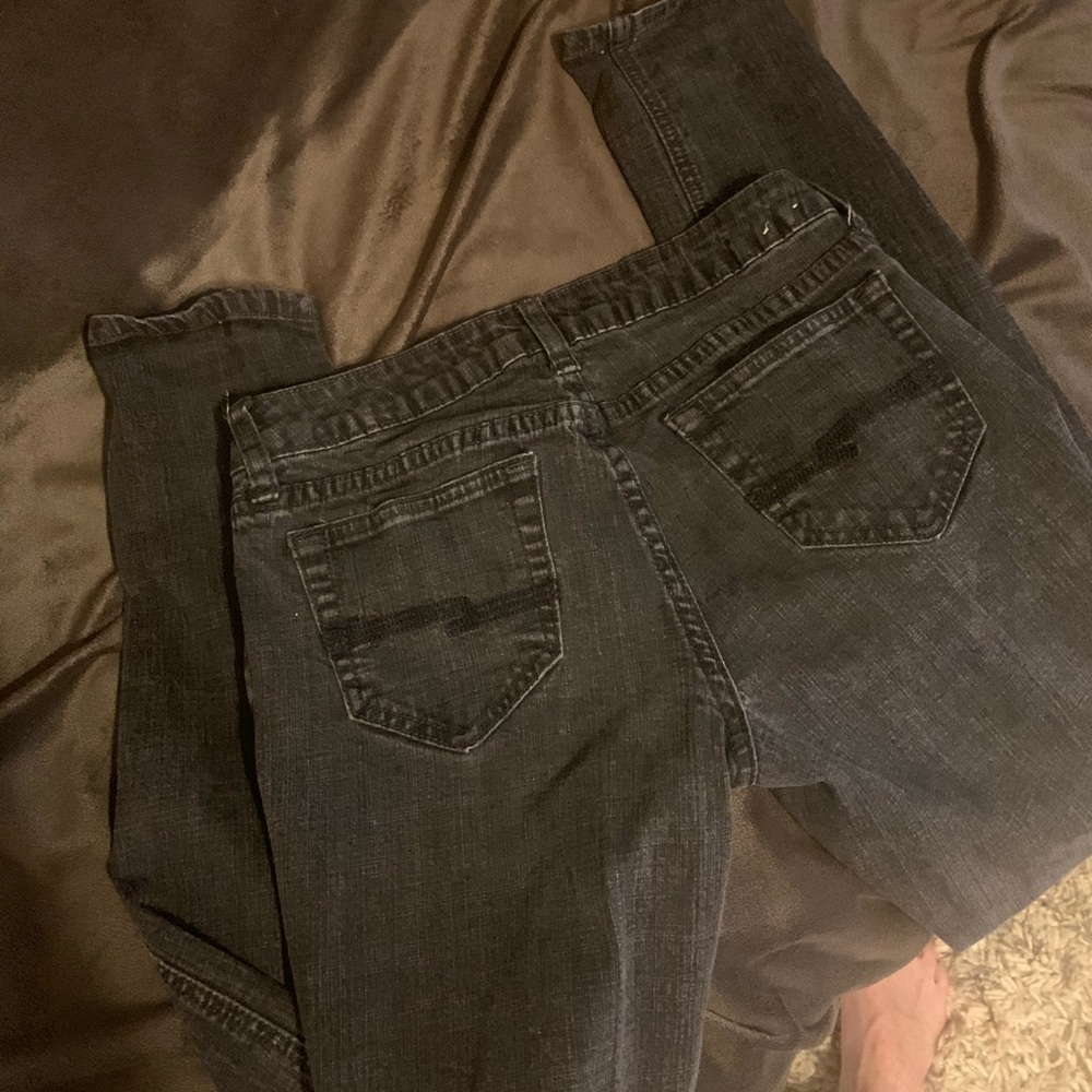 Faded black jeans